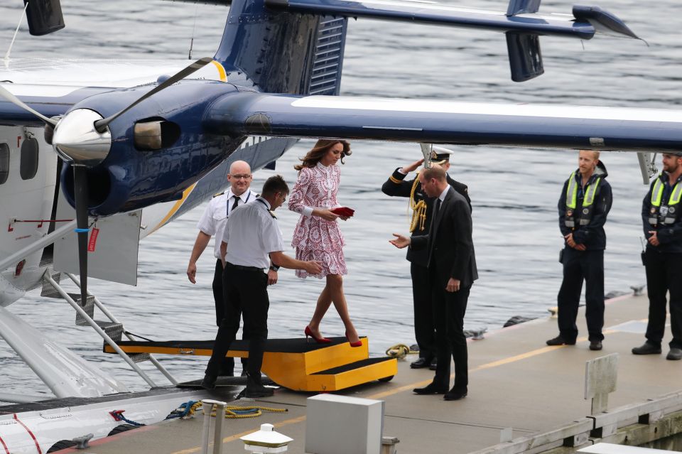  Prince William offers a helping hand to the Duchess as she steps off the seaplane at Vancouver