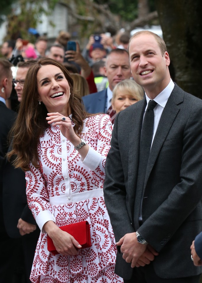  "George would love this," William said as he accepted a bear in a black vest