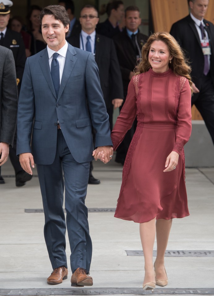  Canada's First Lady Sophie Gregoire Trudeau wore a demure red wine coloured frock with nude heels