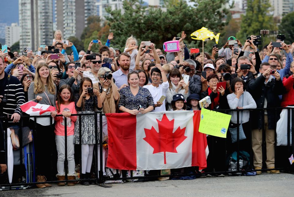 Crowds were determined to meet the Royal couple, crowding along barriers to greet them