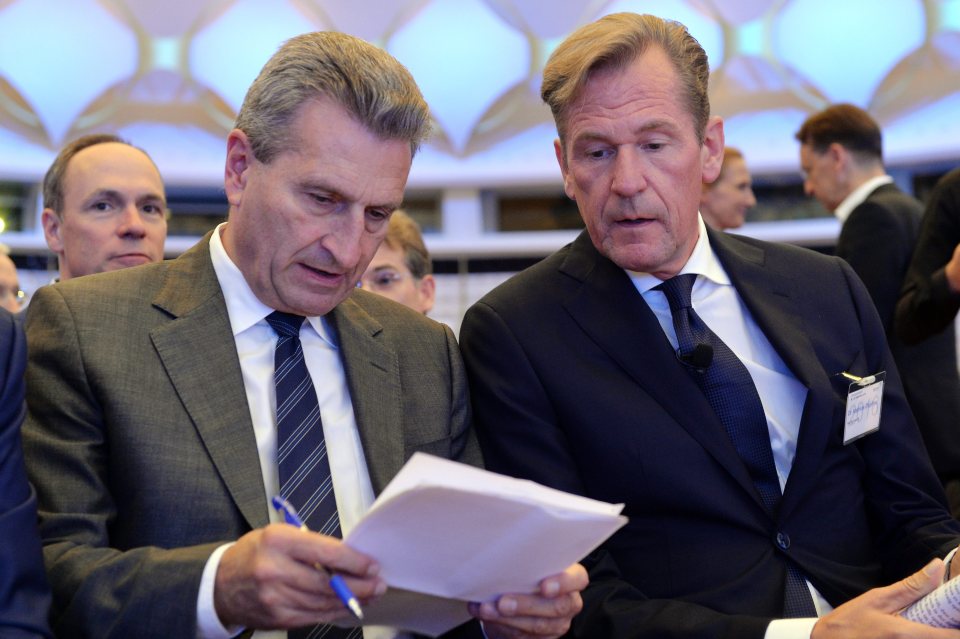  Mr Oettinger, left, was speaking at the European Telecommunications Network Operators’ Association