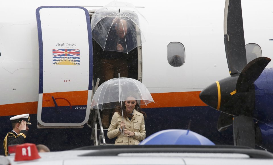 Britain's Catherine, Duchess of Cambridge, leaves an airplane ahead of her husband Prince William during their eight day royal tour to Canada in Bella Bella