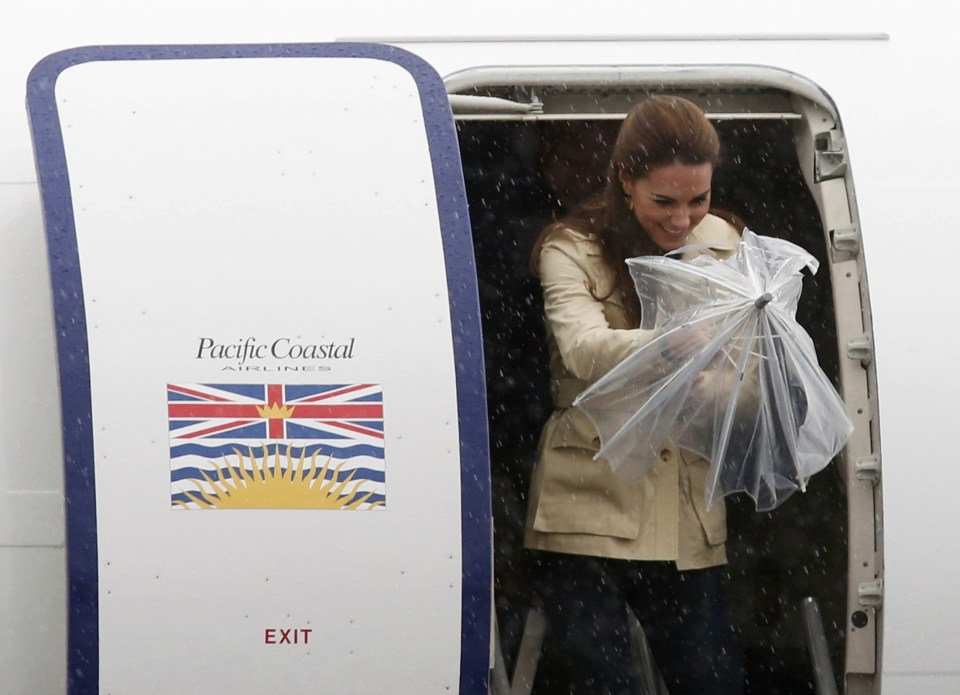 Britain's Catherine, Duchess of Cambridge, leaves an airplane ahead of her husband Prince William during their eight day royal tour to Canada in Bella Bella