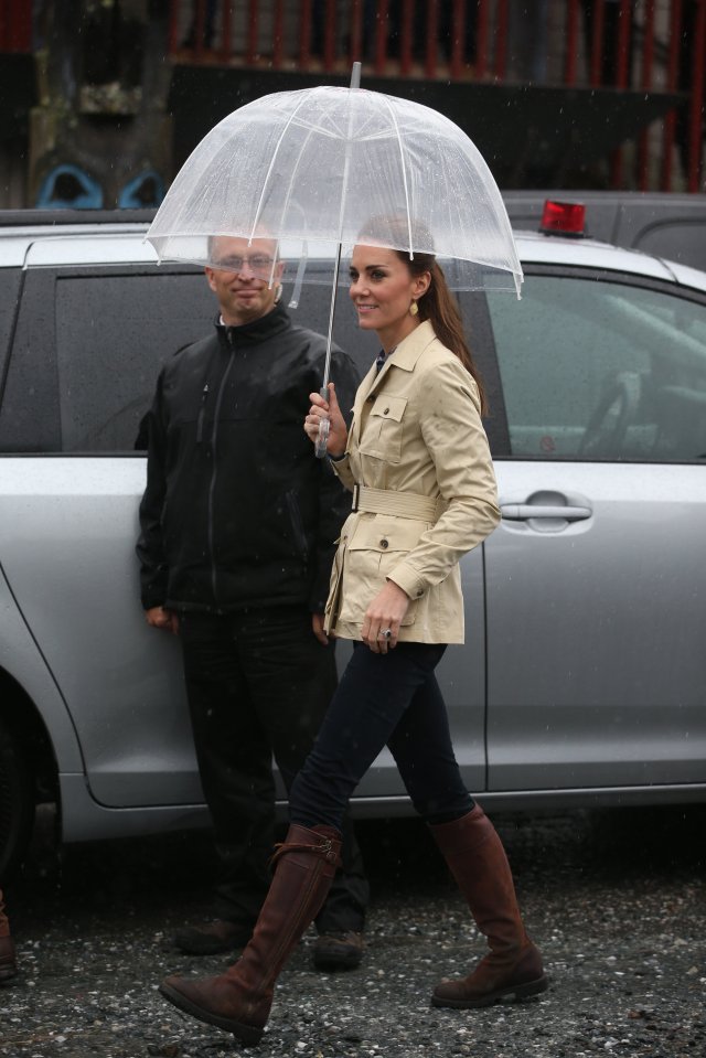  Used to turbulent weather in Britain, the Duchess was not fazed by the rain as she donned a sturdy coat and boots