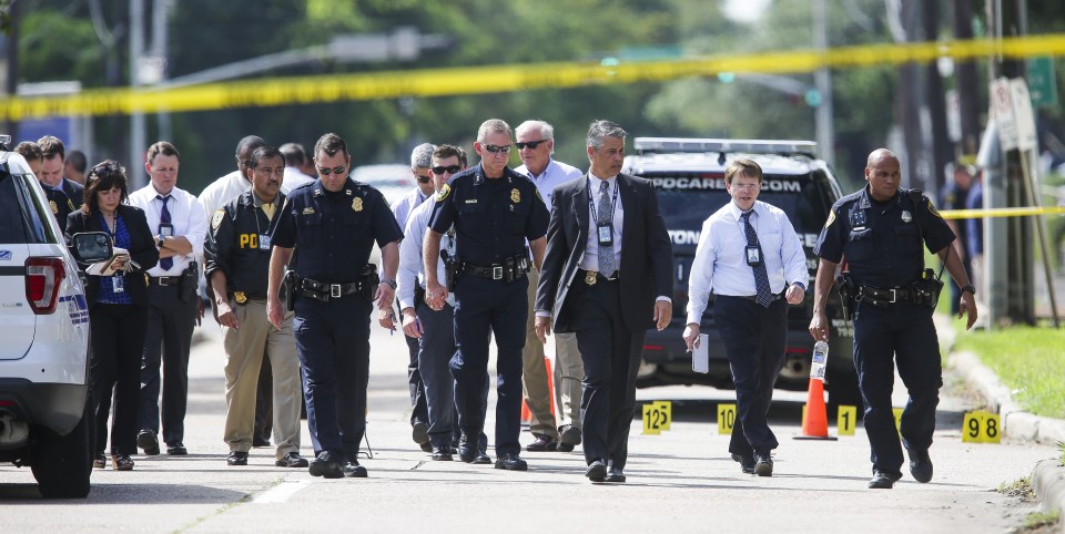  Police investigate the scene in Houston where the shootings took place this morning