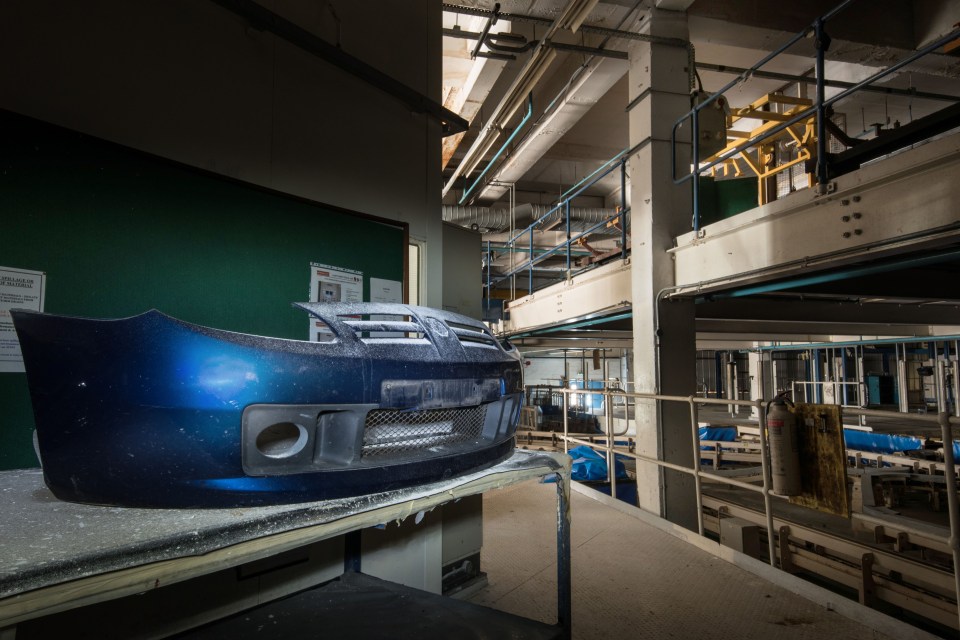  A blue bumper gathers dust in plant that has been closed for 11 years