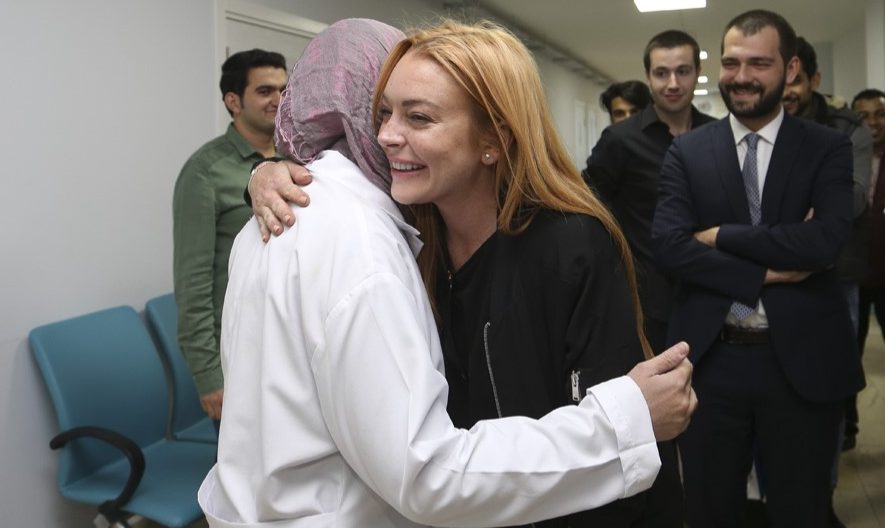  Lohan, 30, was clearly moved by her experience, brought to tears as she chatted with Syrian families