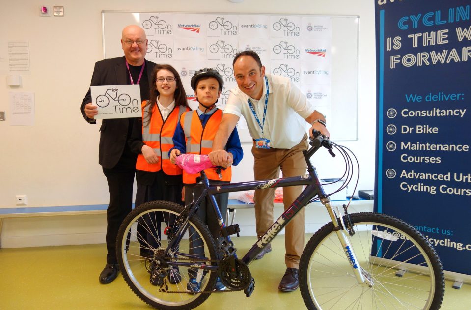  Cllr Tony Jones, pupils Madeline McMillin and Byron Stevens and schools pastoral support officer Bob Burrowes launch scheme