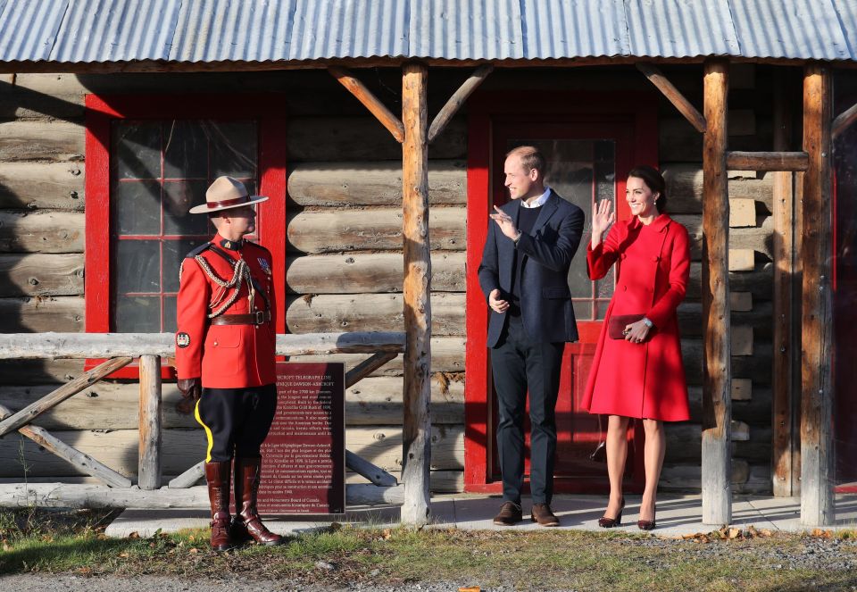 A Royal Canadian Mountain Policeman stands to attention as William and Kate leave the MacBride Museum