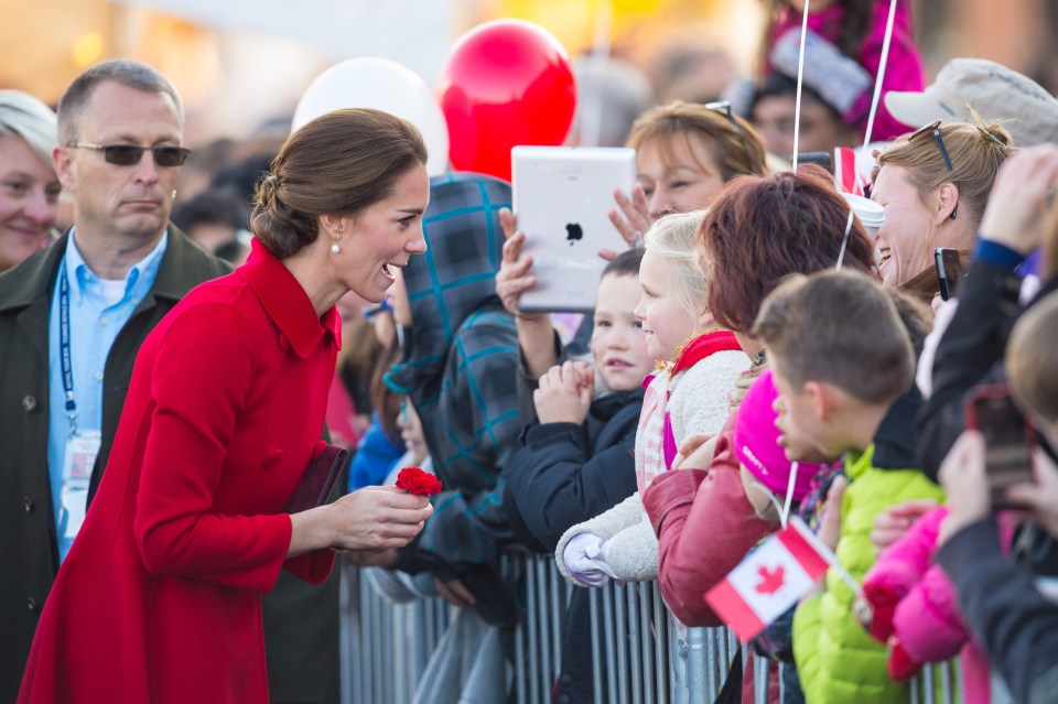 Meanwhile, Kate was seen receiving flowers and charming onlookers, who had lined the streets in their thousands