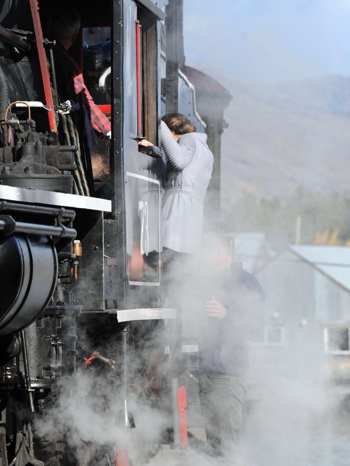 Daring Kate clambered up onto the train's engine to have a closer look