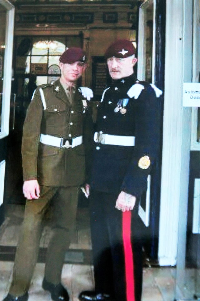 Soldier Nick Bezuidenhout with his stepdad, Mick on his wedding day.