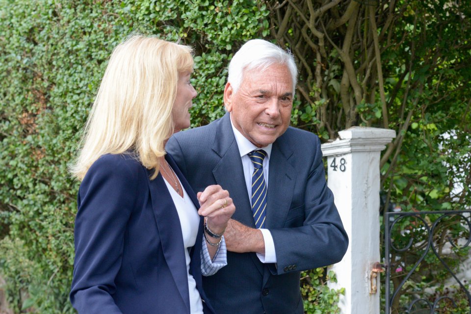  Mervyn Conn with a female companion as he leaves Kingston Crown Court today