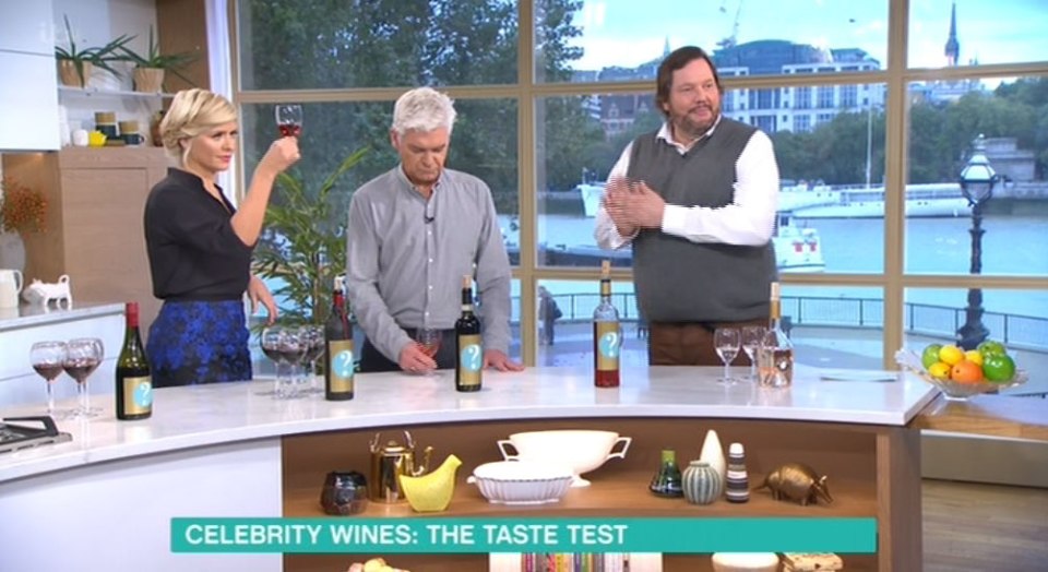  Holly was gently mocked by wine expert Joe Wadsack as they tried celebrity tipples