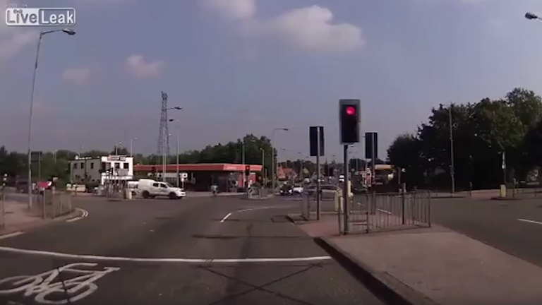  The cyclist can be seen close to the other side of the crossing after pedalling across a white 4X4