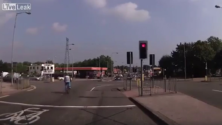  He then cycles into moving traffic with a total disregard for his own safety