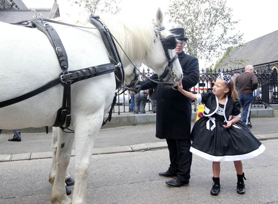  Young mourners were fans of the pristine white horses