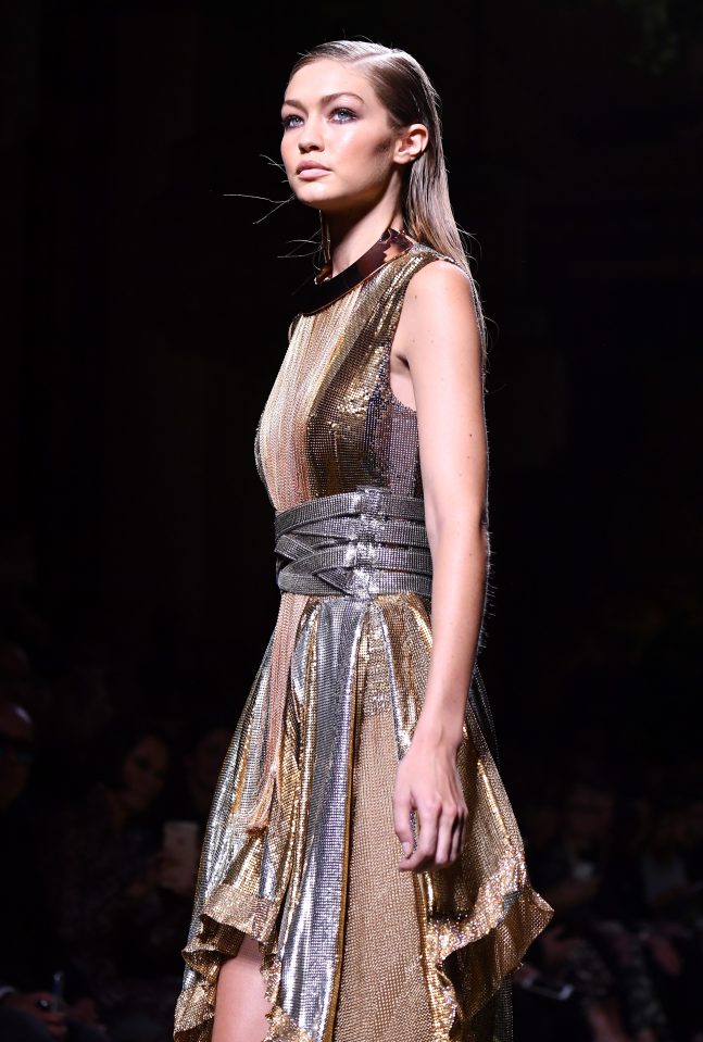  She also wowed in this metallic dress