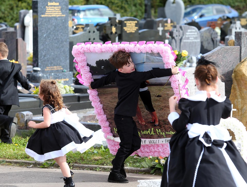  Huge floral displays were laid out in memory of Violet Crumlish