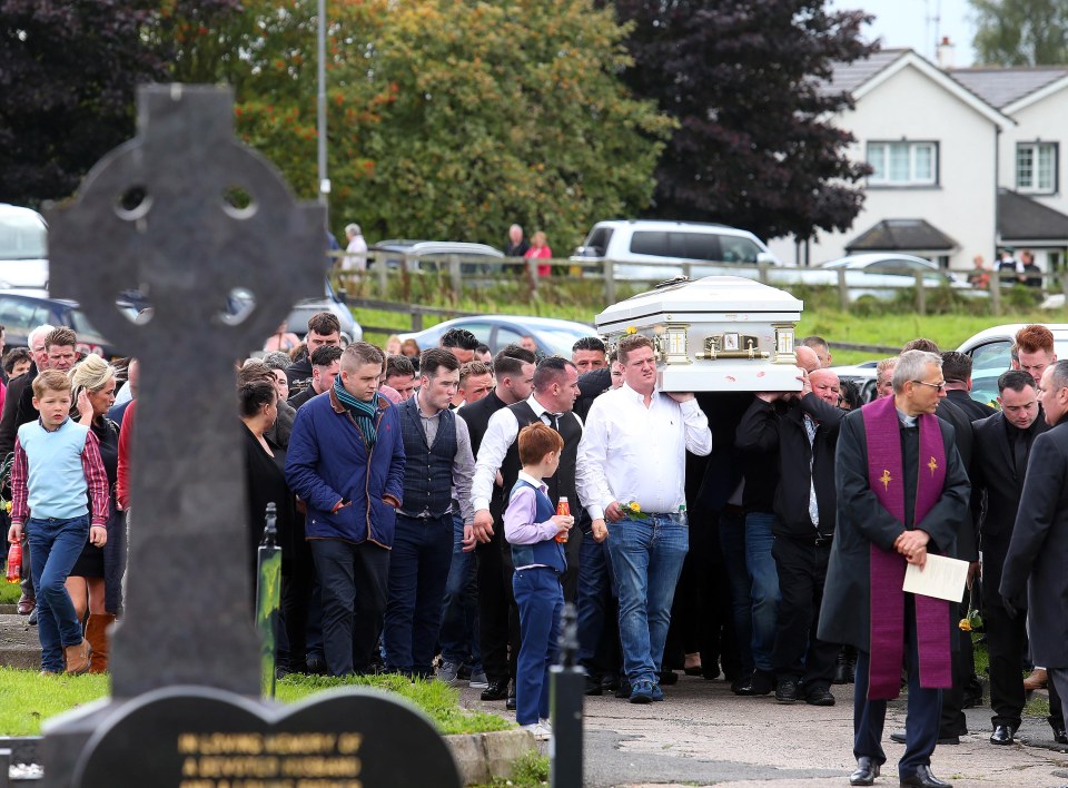  Hundreds of mourners gathered to pay their respects