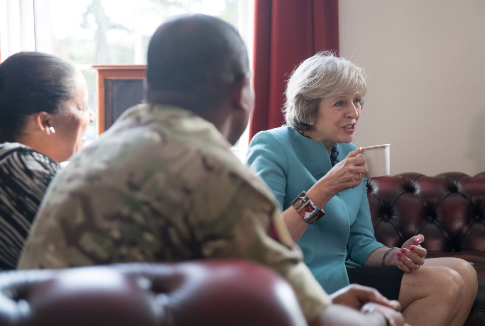  Ready to go . . . Theresa May meets brave troops and talks through new plan to stop wild allegations