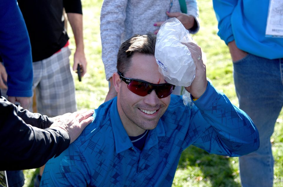  This fan looks oddly happy about being hit on the head by a Danny Willett drive