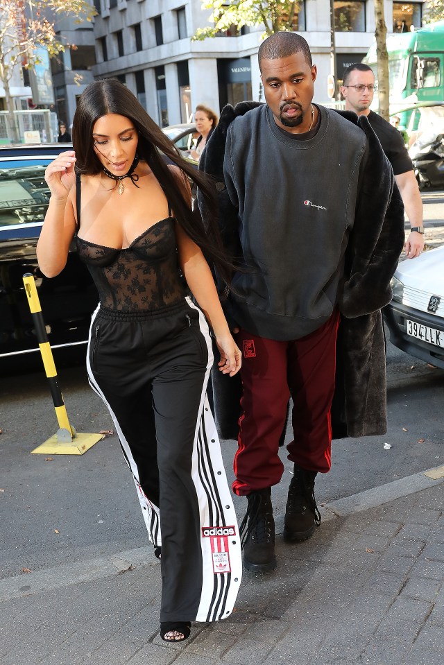 Kim Kardashian, Kanye West and Kourtney arrive at Givenchy. Paris, France on the 29th September