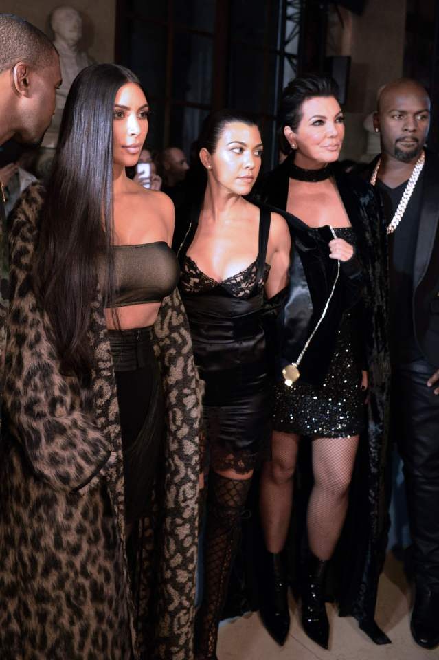 While Kanye looked less than interested at the event - it appeared his wife could still make him smile 