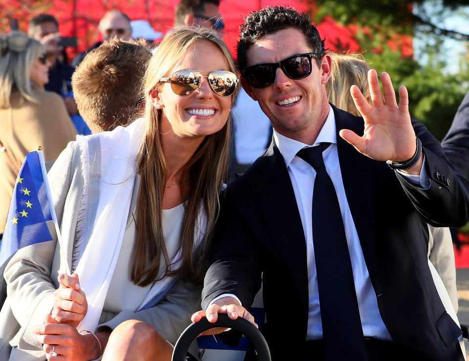  Erica Stoll and Rory McIlroy of Europe at the opening ceremony