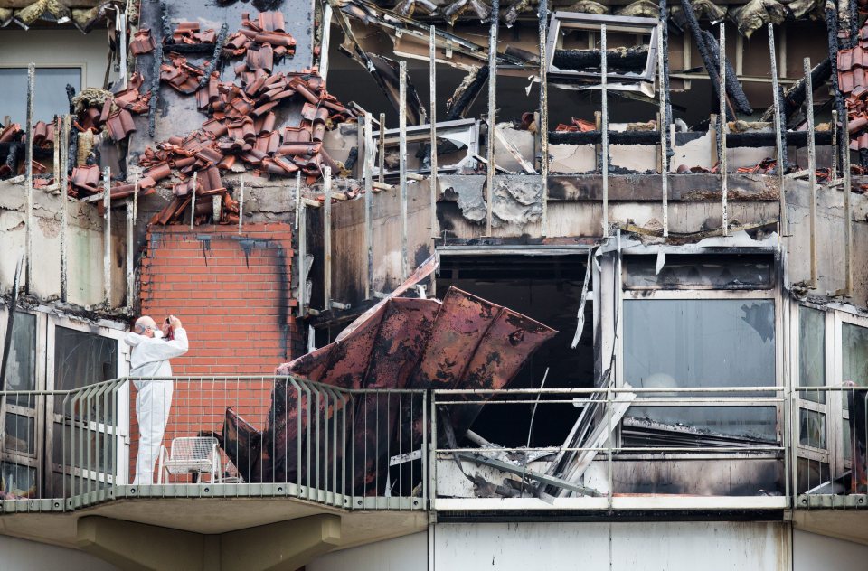  An exterior view of the burned and collapsed roof