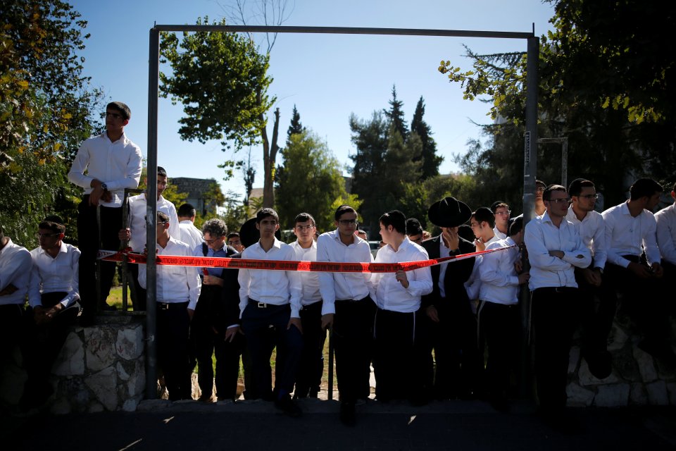  Ultra-Orthodox Jewish youths gathered near Mount Herzl cemetery before the service today