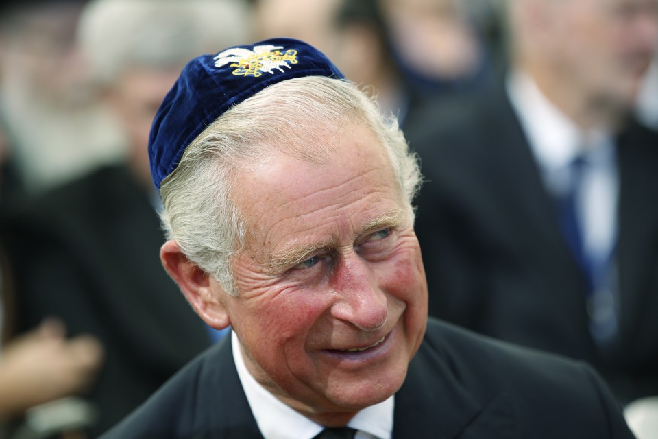 Prince Charles was seen wearing a traditional Jewish kippah, or skullcap - like many of the guests 