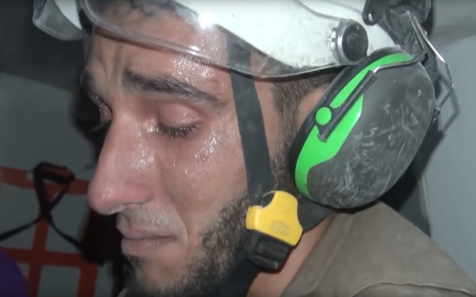  Abu Kifah, one of the civil defence volunteers, burst into tears after rescuing the baby girl from the rubble