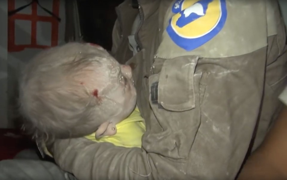  Syria's White Helmets rescued a 30-day old baby from the rubble following a bombing in Aleppo by Assad and Russia jet fighters