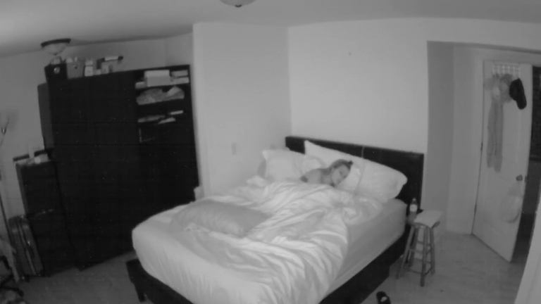  A woman appears to have captured a 'ghost' entering her room