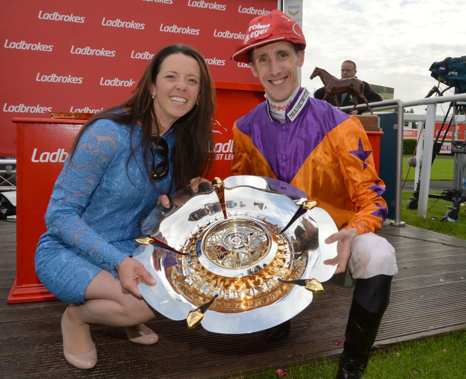  Laura Mongan and George Baker celebrating Harbour Law's St Leger win