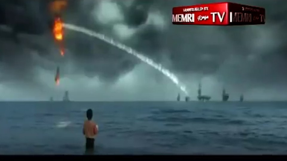  The start of the video shows a small boy watching a plane being gunned down by a US warship