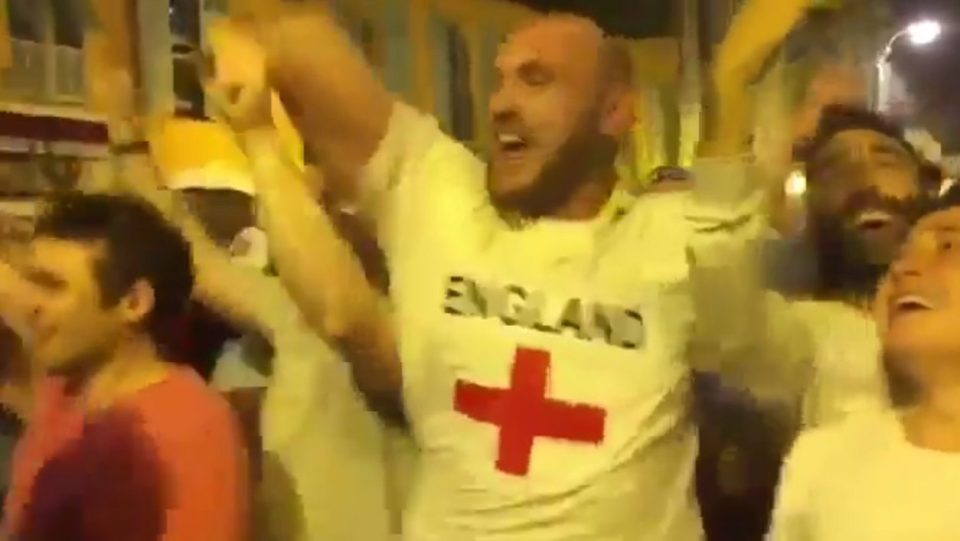  Fury singing away in and England shirt