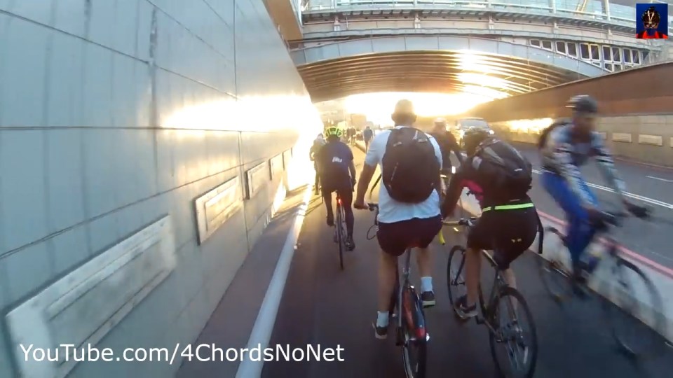  A female rider with a pink and black cycling top on overtook the cameraman before the collison