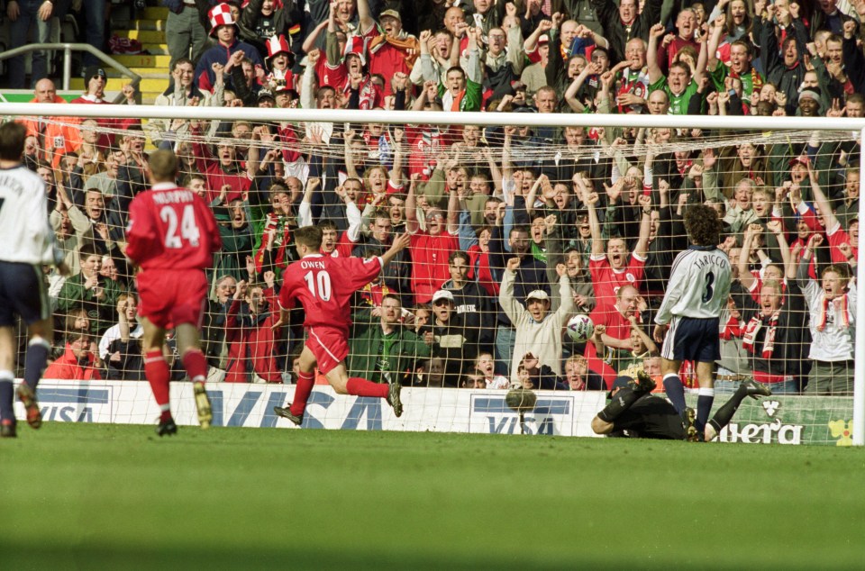  Michael Owen reels away after scoring for Liverpool in match against Tottenham