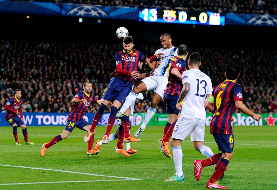  Vincent Kompany scored for Manchester City, but it wasn't enough in Nou Camp loss