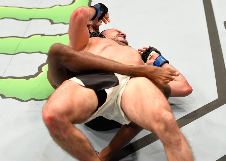  Choked out: Leon Edwards applies the fight-ending rear-naked choke to submit Albert Tumenov