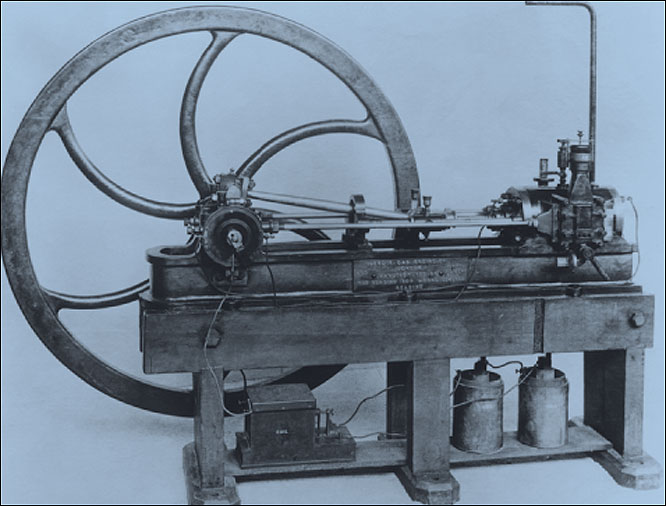  Lenoir gas engine, 1860. The first practical internal combustion engine. The large flywheel is obvious, but you can also see electric batteries to produce a spark inside the cylinder