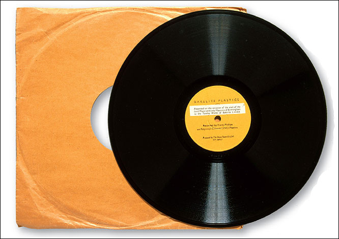  Long playing record from the 1950s, made with a vinyl polymer introduced in 1946.