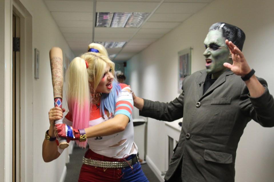  Holly staged a playfight in the hallway with Ben who was dressed as Frankenstein's monster