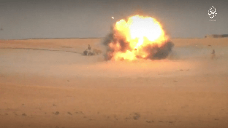  IS fighters are filmed as they take part in fierce fire fights with coalition forces