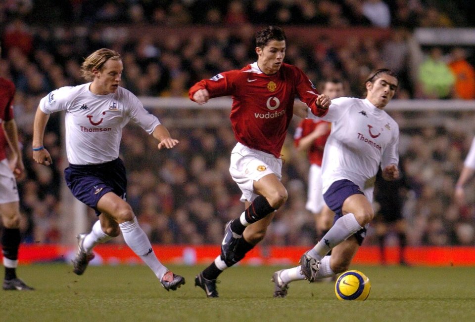 Manchester United's Cristiano Ronaldo fights for the ball with Spurs' Reto Ziegler (L) and Pedro Mendes (R) during tonight's Premiereship clash at Old Trafford in Manchester, Britain, 04 January 2005. Final score 0-0. AFP PHOTO/PAUL BARKER (Photo credit should read PAUL BARKER/AFP/Getty Images)