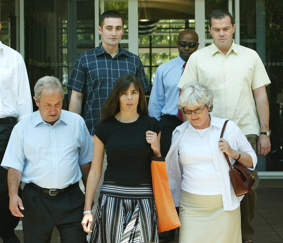  Joanne Lees, centre with the Falconio family Luciano, left, Joan, right, Paul, back left, and Nick, back right, as they leave the Northern Territory Supreme Court