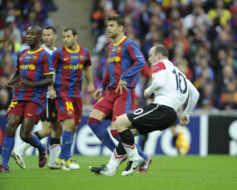  Barcelona players can only watch as Rooney curls in a leveller at Wembley