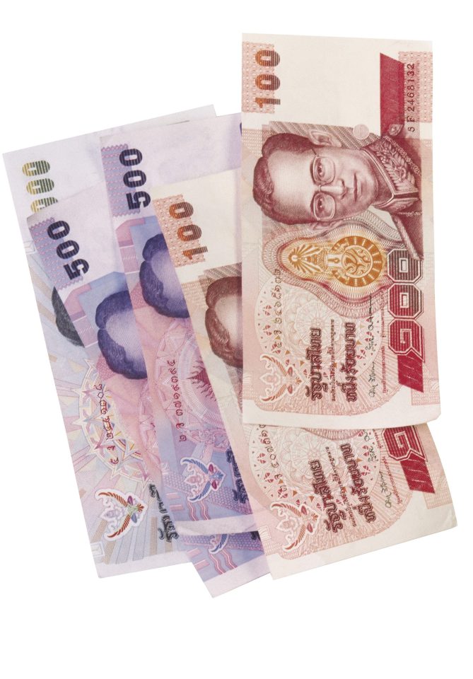  The revered monarch was pictured on Thai currency